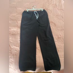 FIGS technical collection black scrub pants.